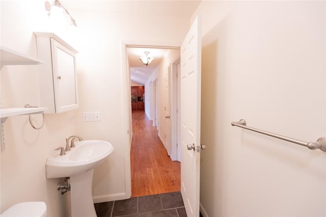 bathroom featuring hardwood / wood-style flooring and sink