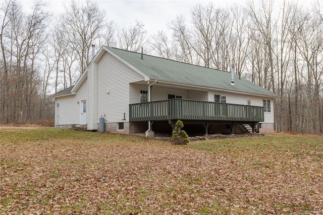 rear view of property with a deck