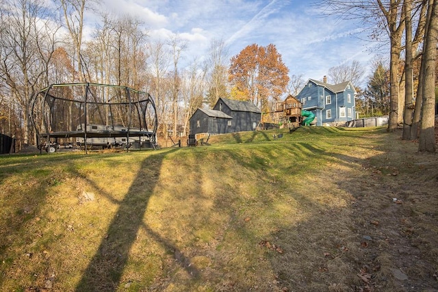 view of yard featuring a trampoline