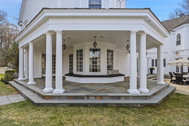 doorway to property featuring covered porch