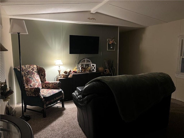 carpeted living room with vaulted ceiling with beams