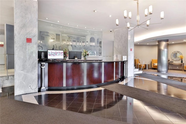 reception area featuring a chandelier