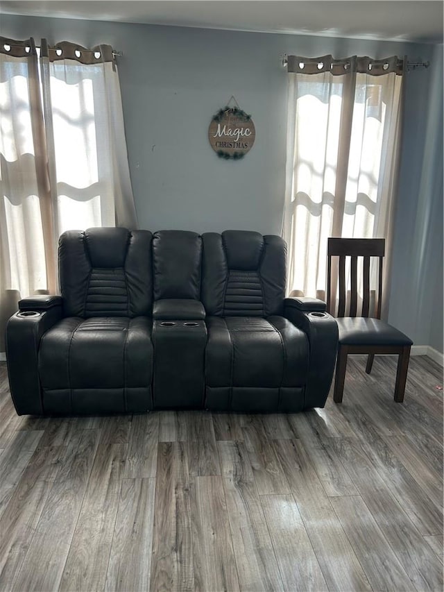 unfurnished living room with wood walls