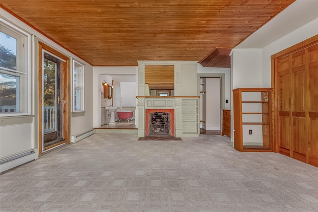 unfurnished living room featuring light carpet, a baseboard radiator, and wood ceiling