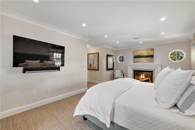 bedroom with ornamental molding and light colored carpet