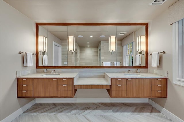 bathroom with vanity and an enclosed shower