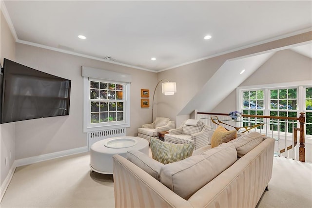 carpeted living room with crown molding and radiator heating unit