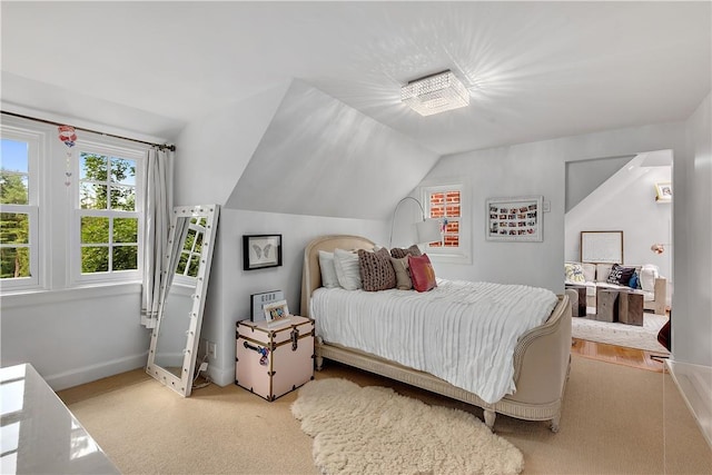 bedroom with lofted ceiling