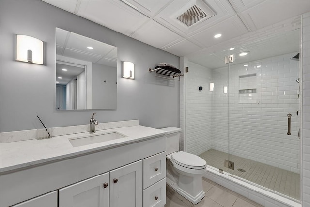 bathroom with vanity, an enclosed shower, tile patterned floors, and toilet