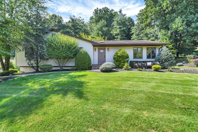 view of front of house with a front lawn