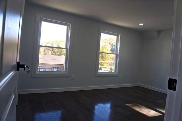 bonus room featuring dark hardwood / wood-style floors