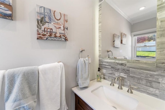 bathroom with vanity and crown molding