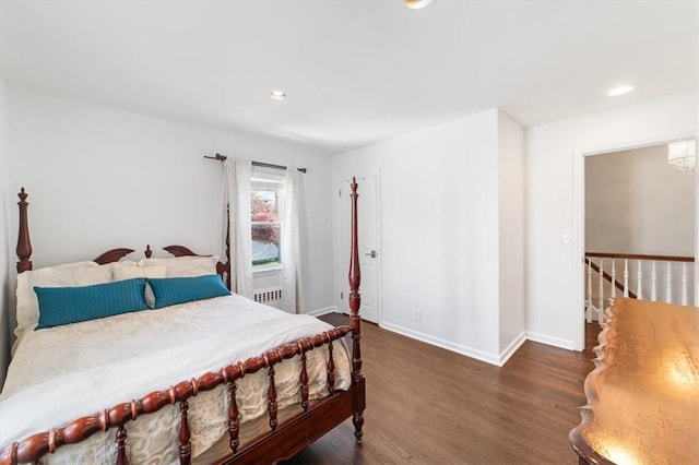 bedroom featuring dark hardwood / wood-style flooring