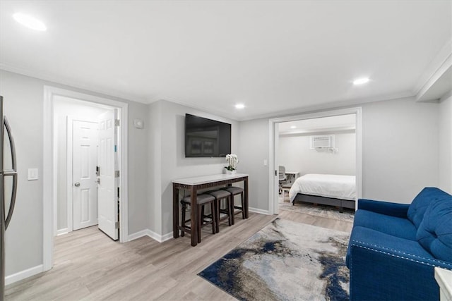 living room with light hardwood / wood-style floors