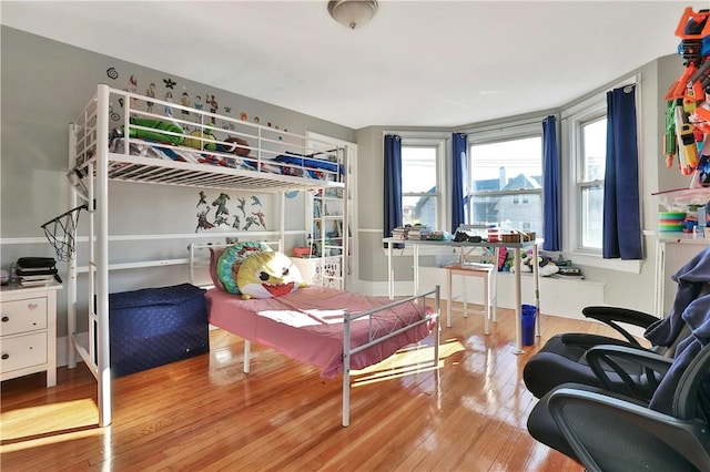 bedroom featuring wood-type flooring