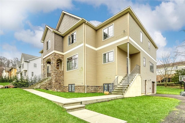 view of side of home featuring a lawn and a garage