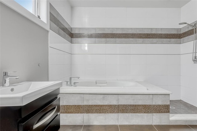 bathroom featuring vanity, tile patterned floors, and independent shower and bath