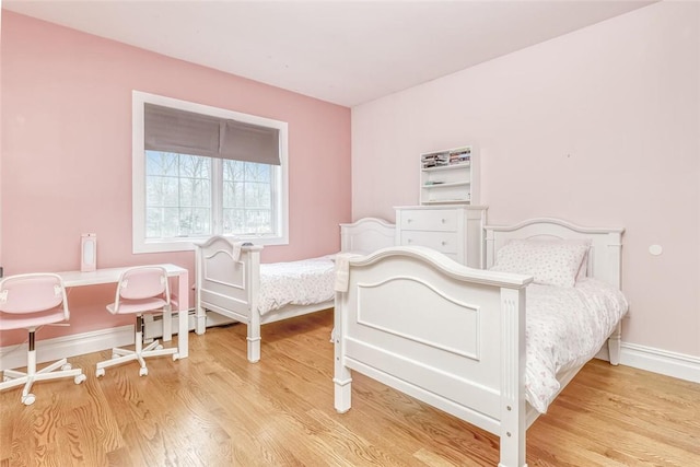 bedroom featuring light hardwood / wood-style flooring