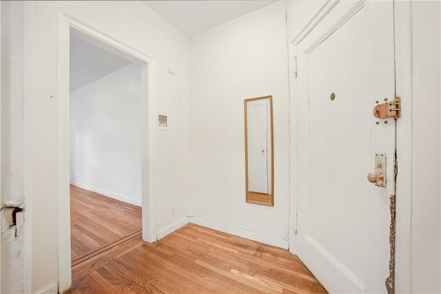 hall featuring light wood-type flooring