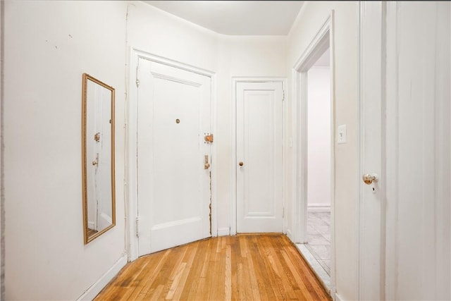 entryway with light hardwood / wood-style flooring