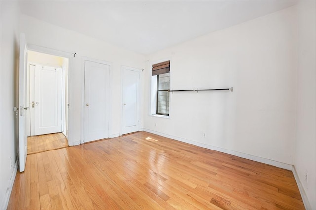 unfurnished bedroom featuring light hardwood / wood-style flooring