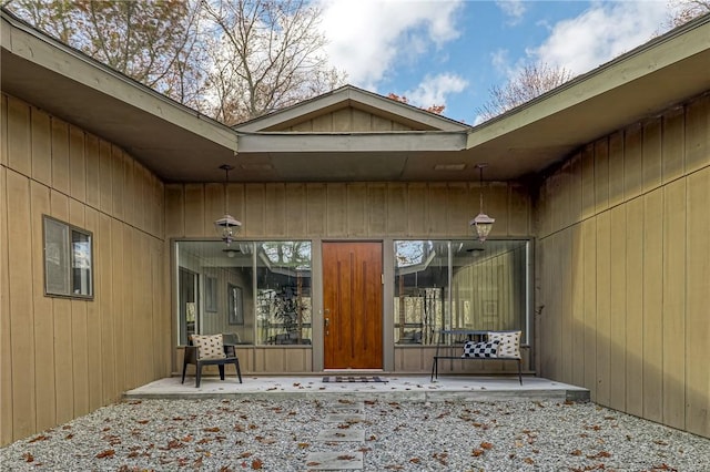 property entrance with a patio