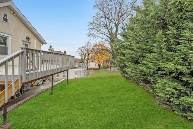 view of yard featuring a wooden deck