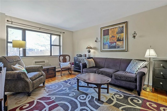 living room with parquet flooring, baseboard heating, and a wall mounted AC