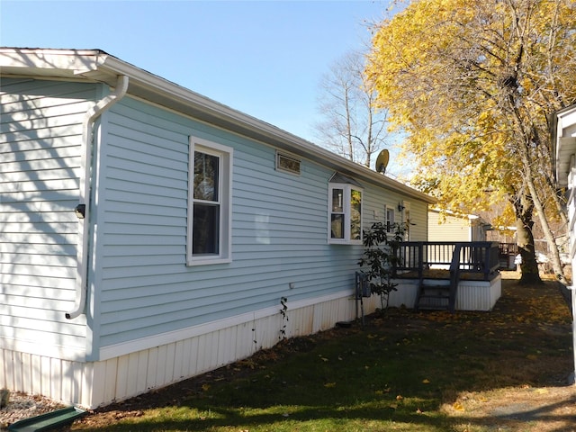 view of home's exterior with a deck