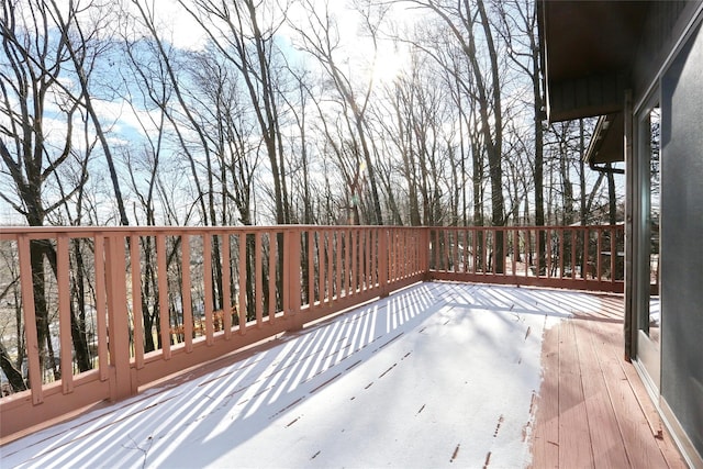 view of snow covered deck