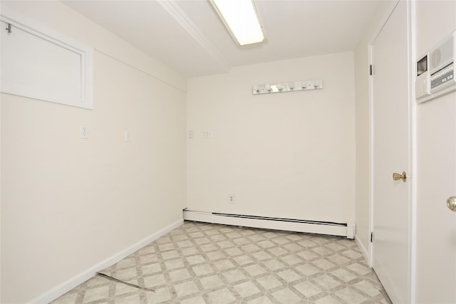 laundry room featuring a baseboard radiator