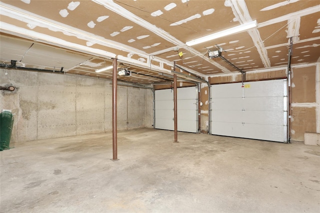 garage featuring a garage door opener