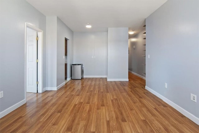 unfurnished room featuring light wood-type flooring