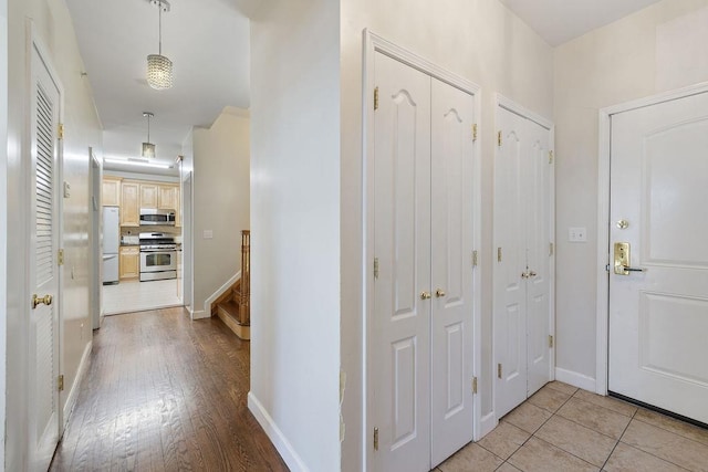 corridor featuring light hardwood / wood-style flooring