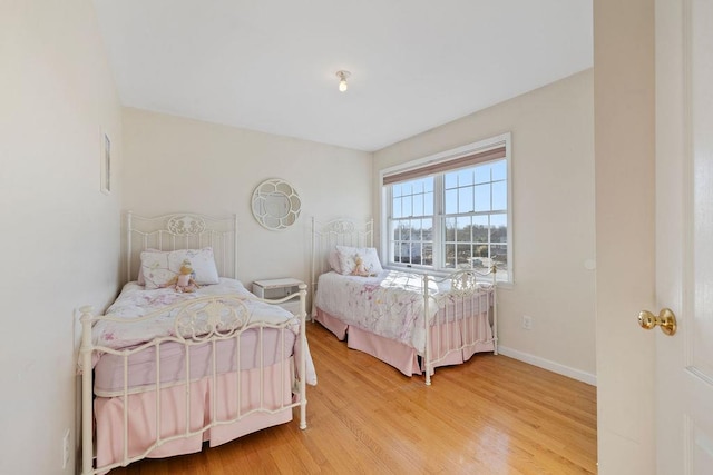 bedroom featuring hardwood / wood-style floors