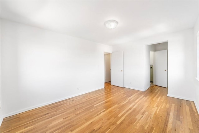 unfurnished bedroom featuring light hardwood / wood-style floors