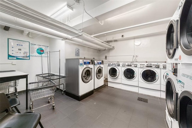 washroom featuring washing machine and dryer