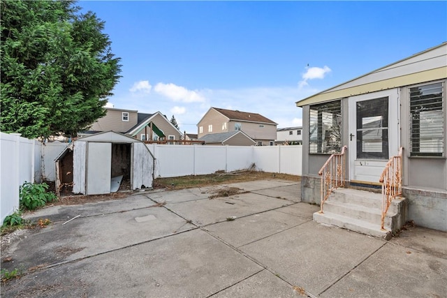 view of patio / terrace featuring a shed