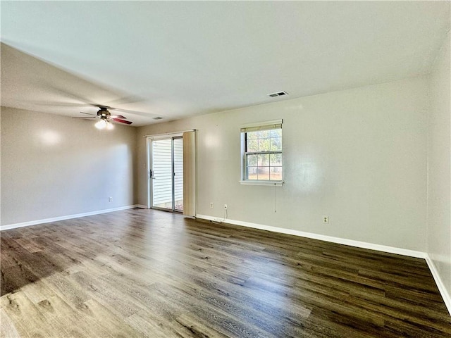 empty room featuring hardwood / wood-style floors and ceiling fan