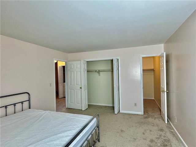 bedroom featuring light colored carpet