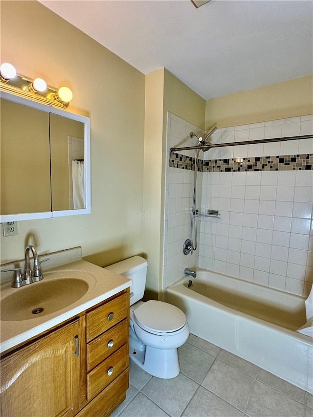 full bathroom featuring tile patterned flooring, vanity, shower / bath combination with curtain, and toilet