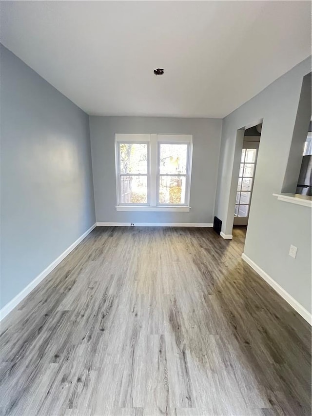 spare room featuring concrete flooring