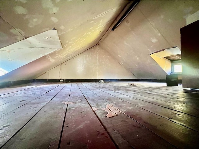 bonus room featuring lofted ceiling