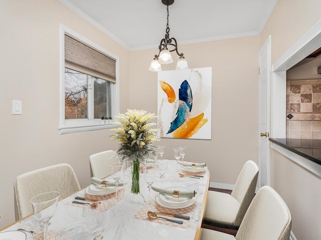 dining space featuring ornamental molding