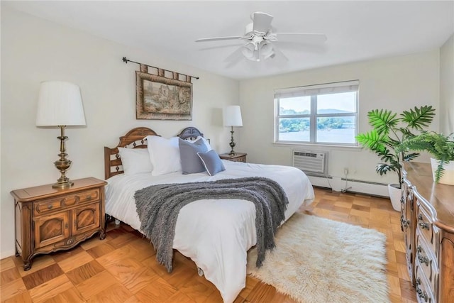 bedroom featuring baseboard heating, ceiling fan, light parquet floors, and an AC wall unit