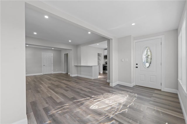 foyer entrance featuring hardwood / wood-style floors