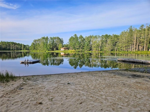 property view of water featuring a dock