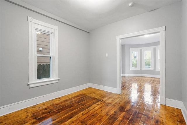 empty room with wood-type flooring