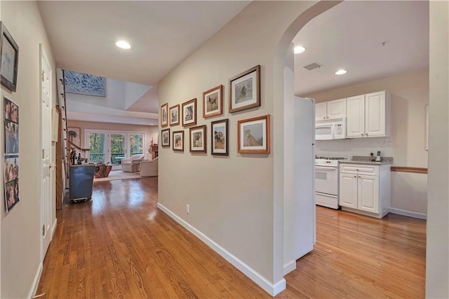 hallway featuring light wood-type flooring