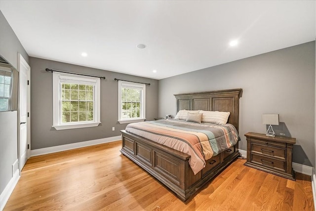 bedroom featuring light hardwood / wood-style floors